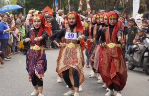 Ratusan Pelajar di OKI Ramaikan Lomba Gerak Jalan dengan Kostum Unik