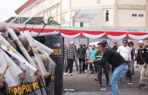 Polres OKI Gelar Apel Dan Simulasi Sipamkota Jamin Keamanan Pilkada 2024.
