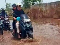Jalan Lingkar Selatan Jakabaring Rusak Parah dan Tergenang, Warga Soroti Dugaan Dampak Penimbunan Lahan